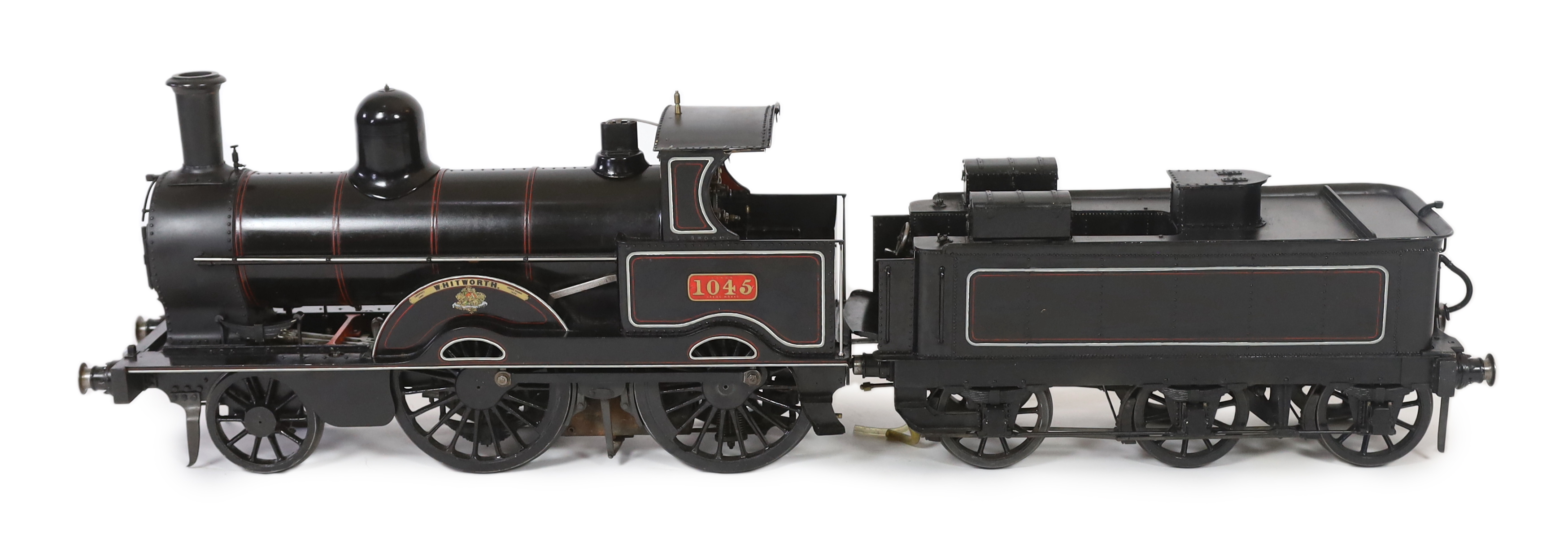 A very finely engineered scratch-built 5” gauge live steam model of a LNWR (London and North Western Railway) Jumbo 2-4-0 tender locomotive, No. 1045 ‘Whitworth’